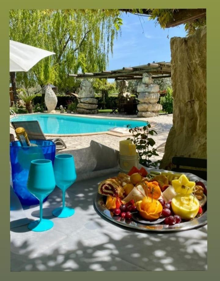 Il Giardino dei Flintstones B&B Cerveteri Exterior foto